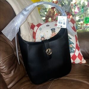 Lululemon Athletica Black and Gold Bag.